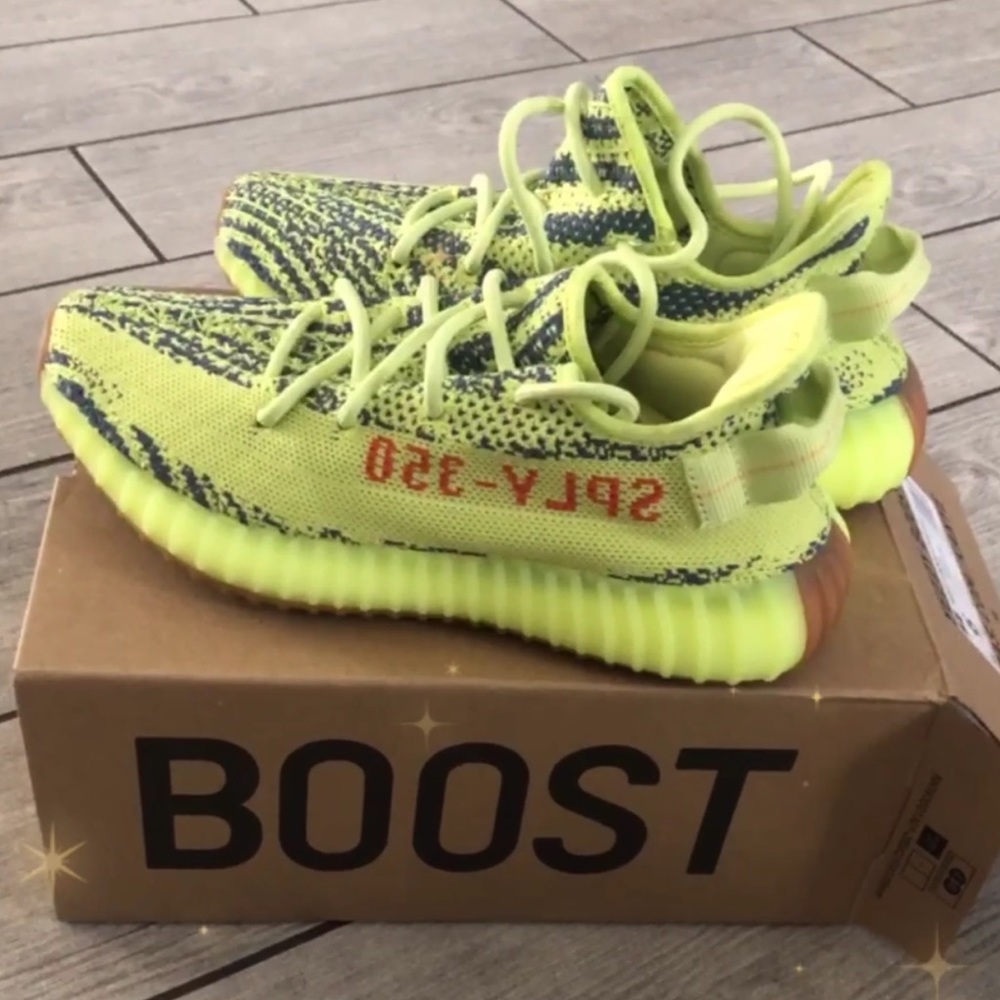 Frozen yellow Yeezy’s! Kids size 5 1/2 Fits women’s size 7